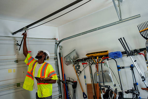 Professional Garage Door technician working in Palm Beach Gardens, FL